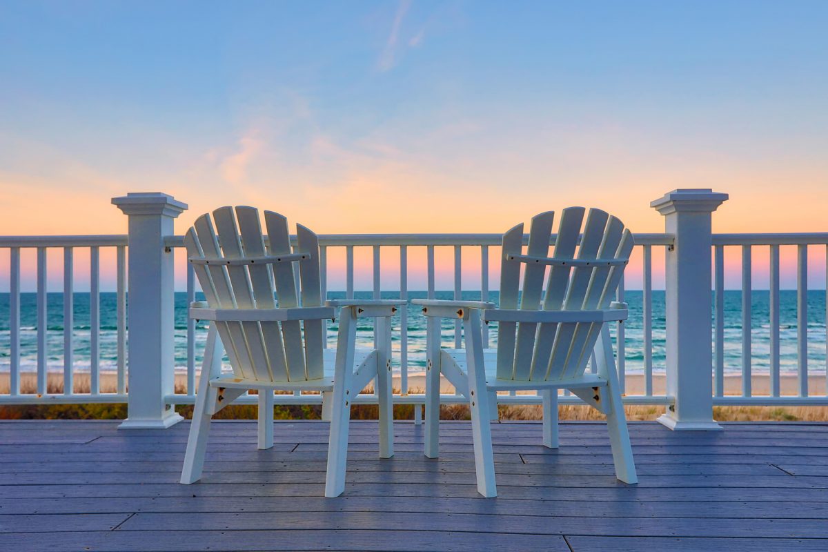 Chairs on a deck on the beach